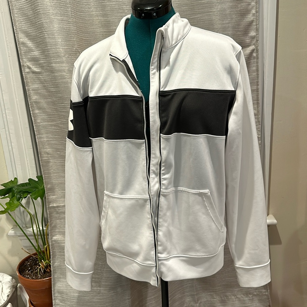 Under Armour semi fitted all season running jacket. Gray and white. L